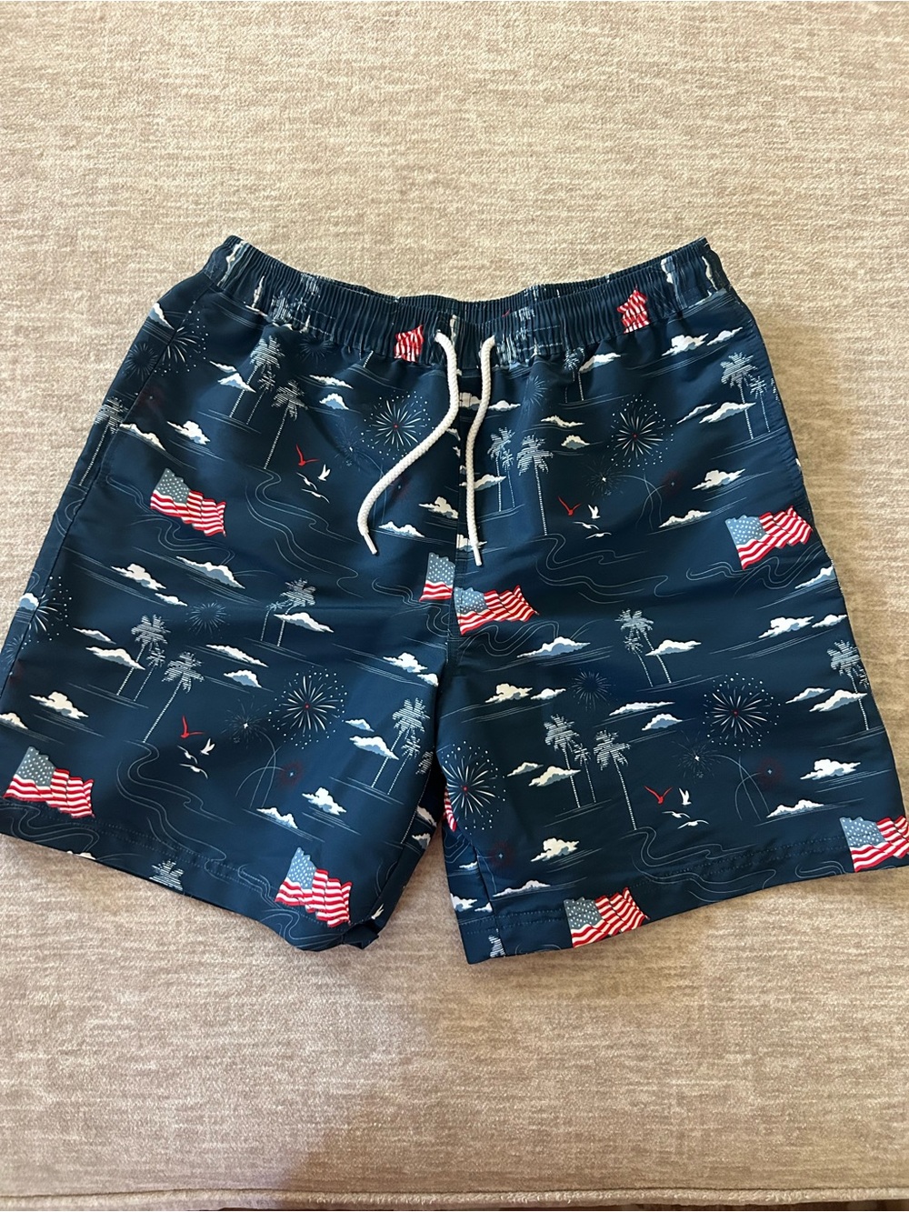 Magellan Outdoors Navy Swim Trunks with Red & White Flag Accents